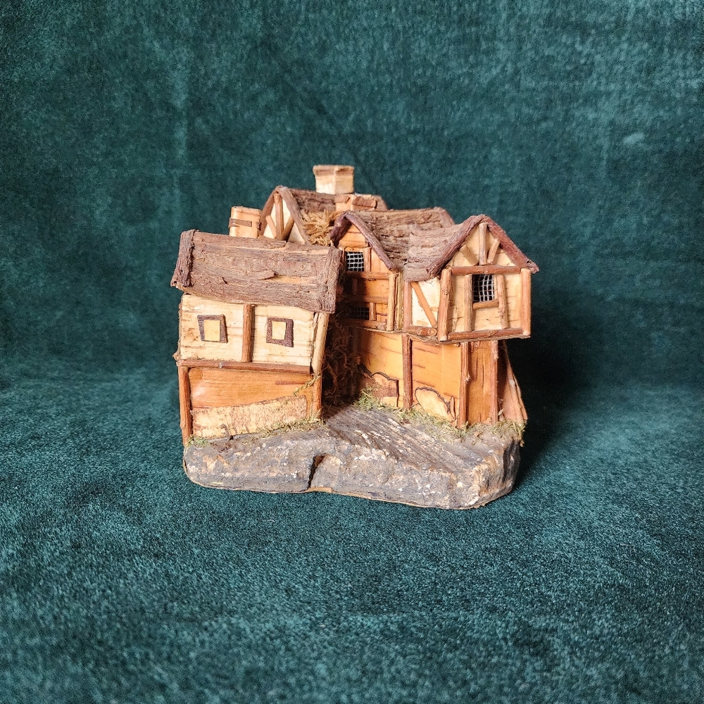 Putz style Wood Bark House